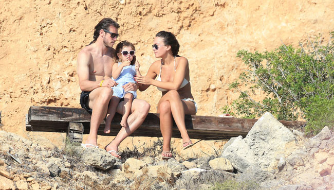 EXCLUSIVE ALL ROUNDER ***MINIMUM FEE £500 APPLIES***NO BYLINE*** The world's most expensive footballer, Gareth Bale, is seen on holiday in Spain with his wife Emma and their daughter Violet Alba. 12 July 2016. ***DO NOT BYLINE*** UK clients should be aware children's faces may need pixelating.