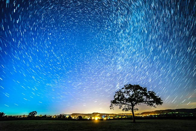 PIC BY Matt Bigwood /Geoff Robinson Photography 07976 880732. Pic shows the Perseid meteor shower at Wotton-under-Edge, in Gloucestershire last night (Aug 10) Photographers across the UK have been capturing the first pictures of the Perseid meteor shower as it reaches its peak tonight (Tues). The annual meteor shower can produce between 50 and 100 shooting stars per hour but conditions for seeing the spectacle are expected to be difficult tonight with cloud, rain and thunder forecast for some areas. Matt Bigwood managed to get a good view of the display at Wotton-under-Edge, in Gloucestershire at around 11pm last night (Mon). "I saw four or five meteors with the naked eye, but they actually showed up a lot better in the photos," he said. "I also managed to get some photos showing the meteors near the Milky Way." Each year the meteor shower is active between July 17 and August 24 as the Earth's orbit around the Sun passes through the cosmic trailing from the tail of Comet Swift-Tuttle, which last passed through our vicinity in 1992. SEE COPY CATCHLINE First pics of Perseid Meteor shower