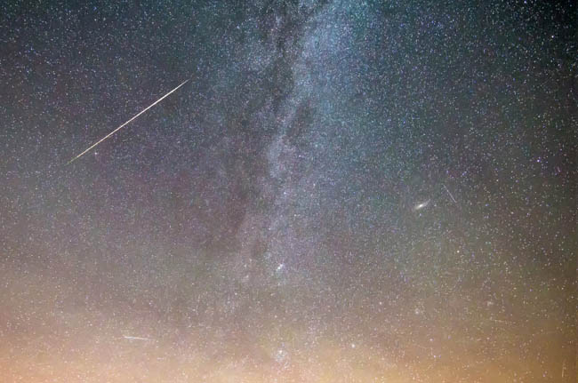 The Perseid Meteor Shower seen over Orcombe Point, Devon. The meteor shpwer is one of the most spectacular shows of the year, with meteors being seen from the 17 July through to the 24 August. The peak of the display is between the 9  13 August, when there will be between 80 and 100 meteors per hour, unfortunately at the peak this year a bright moon will make viewing difficult. The meteors are the debris from the Comet Swift-Tuttle, the radiant of the display is constellation of Perseus.