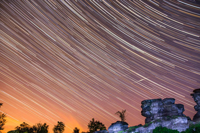 PIC BY Andrew Hawkes /Geoff Robinson Photography 07976 880732. Andrew Hawkes took a picture of the Perseid meteor shower at Grimwith Reservoir in the Yorkshire Dales. Photographers across Britain have captured an array of incredible pictures of the Perseid meteor shower as it reached its peak last night (Wed) and the skies cleared. Skygazers in the north of the country managed to get some good shots of the shower which coincided with a new moon for the first time since 2007, creating perfect viewing conditions. The annual meteor shower can produce between 50 and 100 shooting stars per hour and put on a dazzling display. Jan Knurek managed to get a picture of the perseids over Evesham in Worcestershire early this morning (Thurs). Whilst photographer John Phelan got a picture above an old tin mine between Morvah and St Ives in Cornwall in the early hours (Thurs). Photographer Stephen Cheatley managed to get a fantastic photo of the Perseid meteor over Mount Teide in Tenerife yesterday (Wed). Each year the meteor shower is active between July 17 and August 24 as the Earth's orbit around the Sun passes through the cosmic trailing from the tail of Comet Swift-Tuttle, which last passed through our vicinity in 1992. SEE COPY CATCHLINE Latest Perseid meteor pics